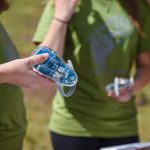 Photo of a hand holding AQ-go air quality sensor.